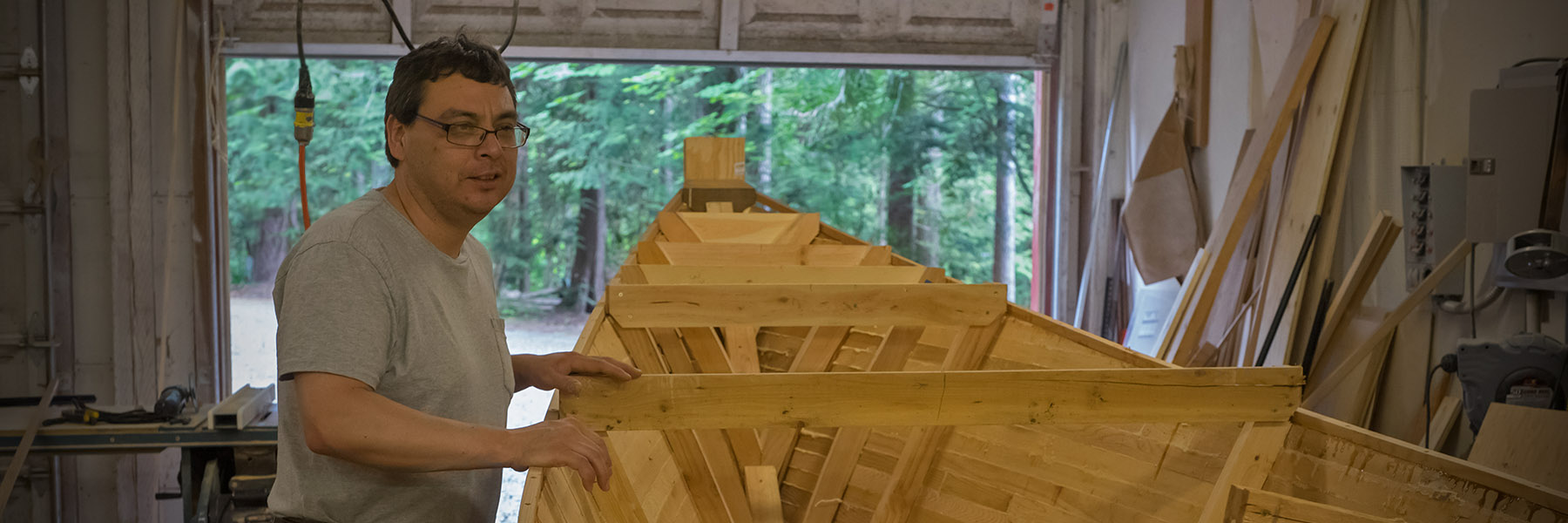 Brian with strip canoe build